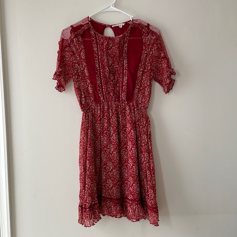 Romantic red dress with sheer details